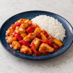 Курица в кисло-сладком соусе с рисом и сладким перцем